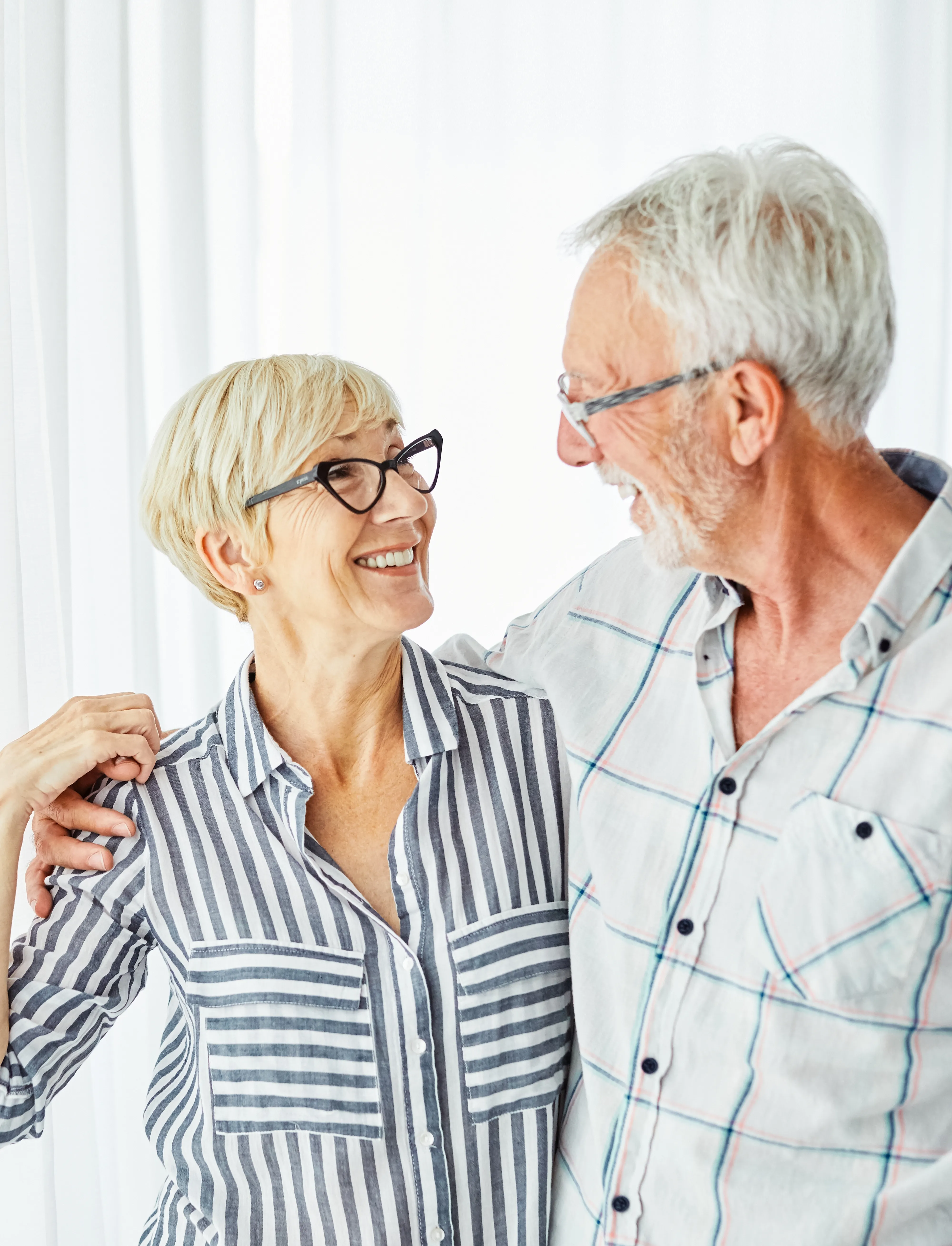 An older couple smiling together